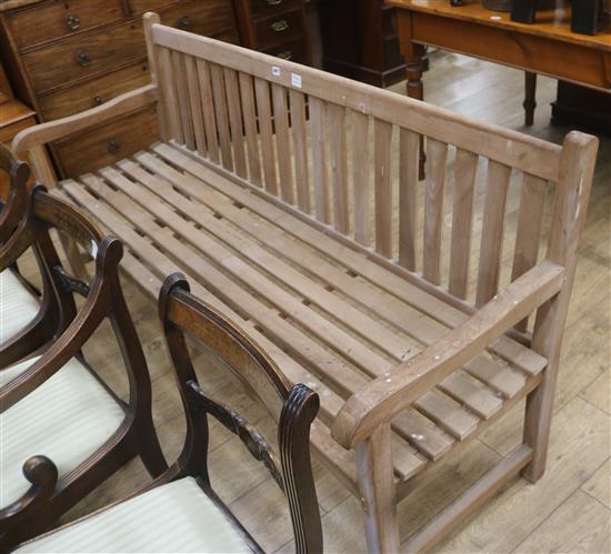 A teak garden bench W.180cm